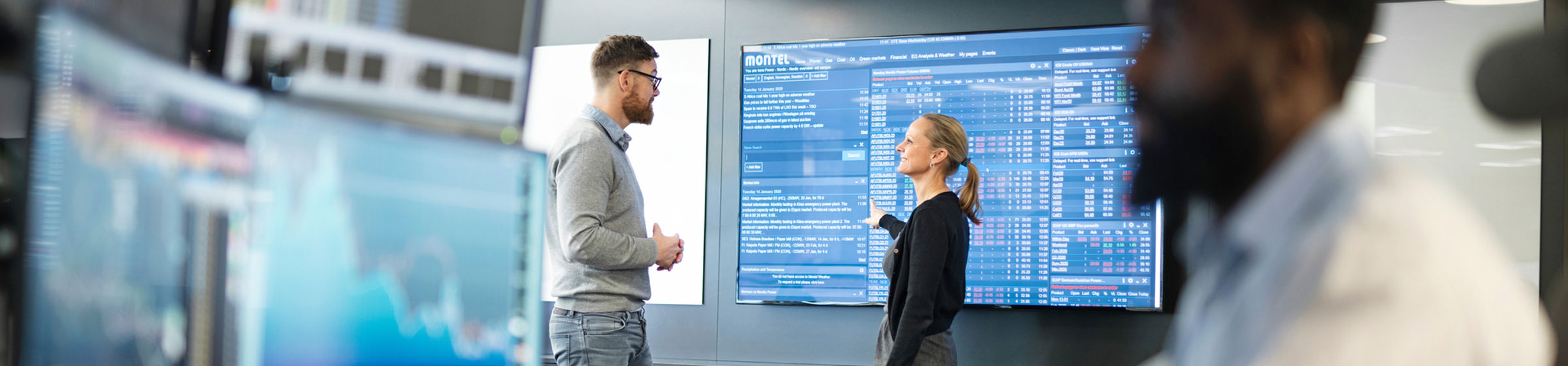 People in front of screens