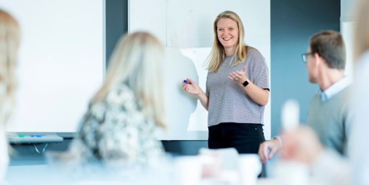 Trainees in a meeting